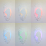 Viscosity All-White sconce light fixture shown in various colors achieved with Philips Hue Color-Changing Lightbulb, Daytime